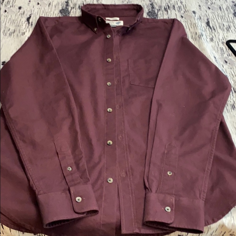 Men’s burgundy casual dress shirt.